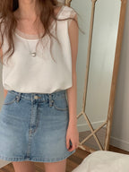 With Sleeveless Top