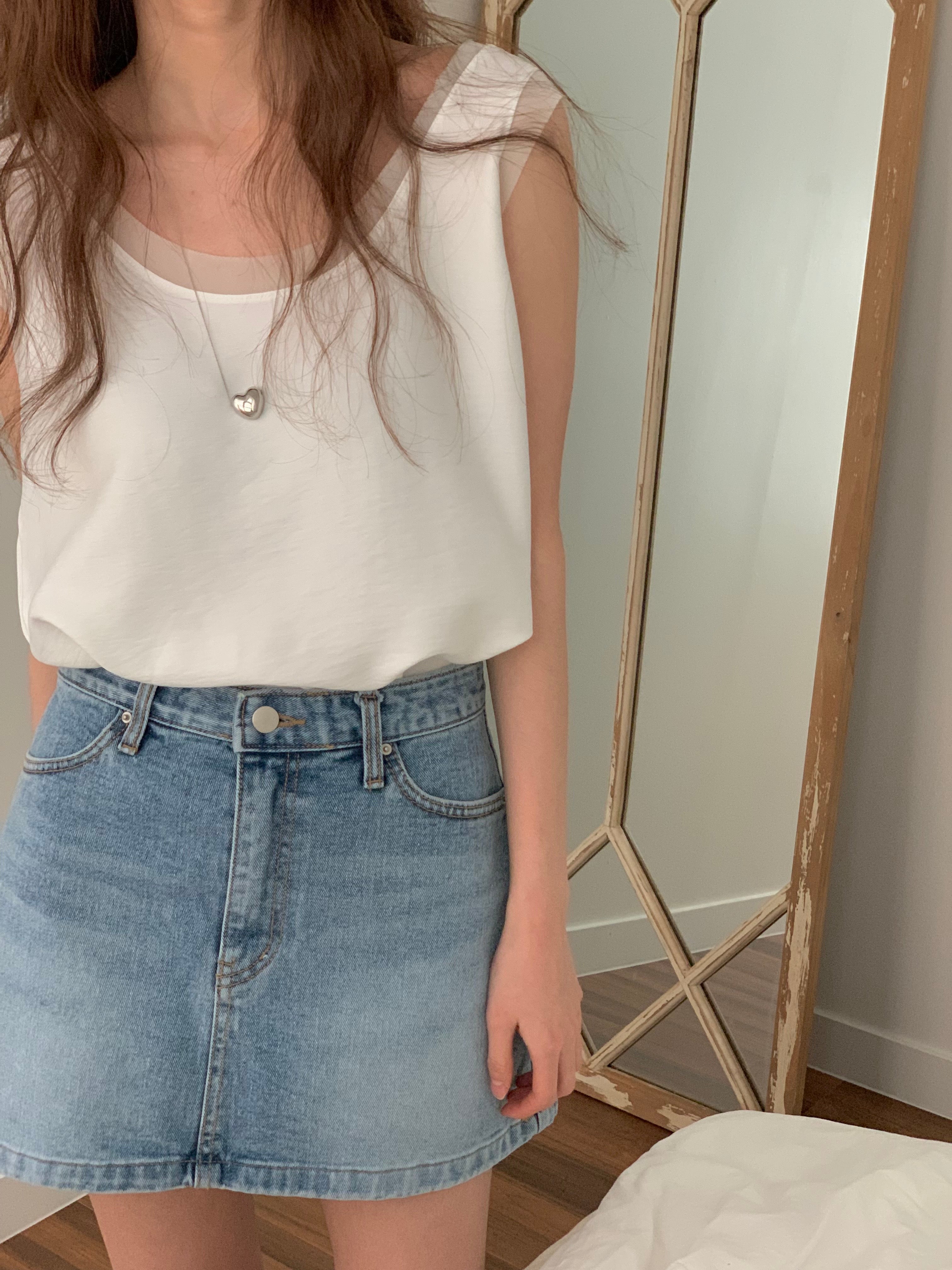 With Sleeveless Top