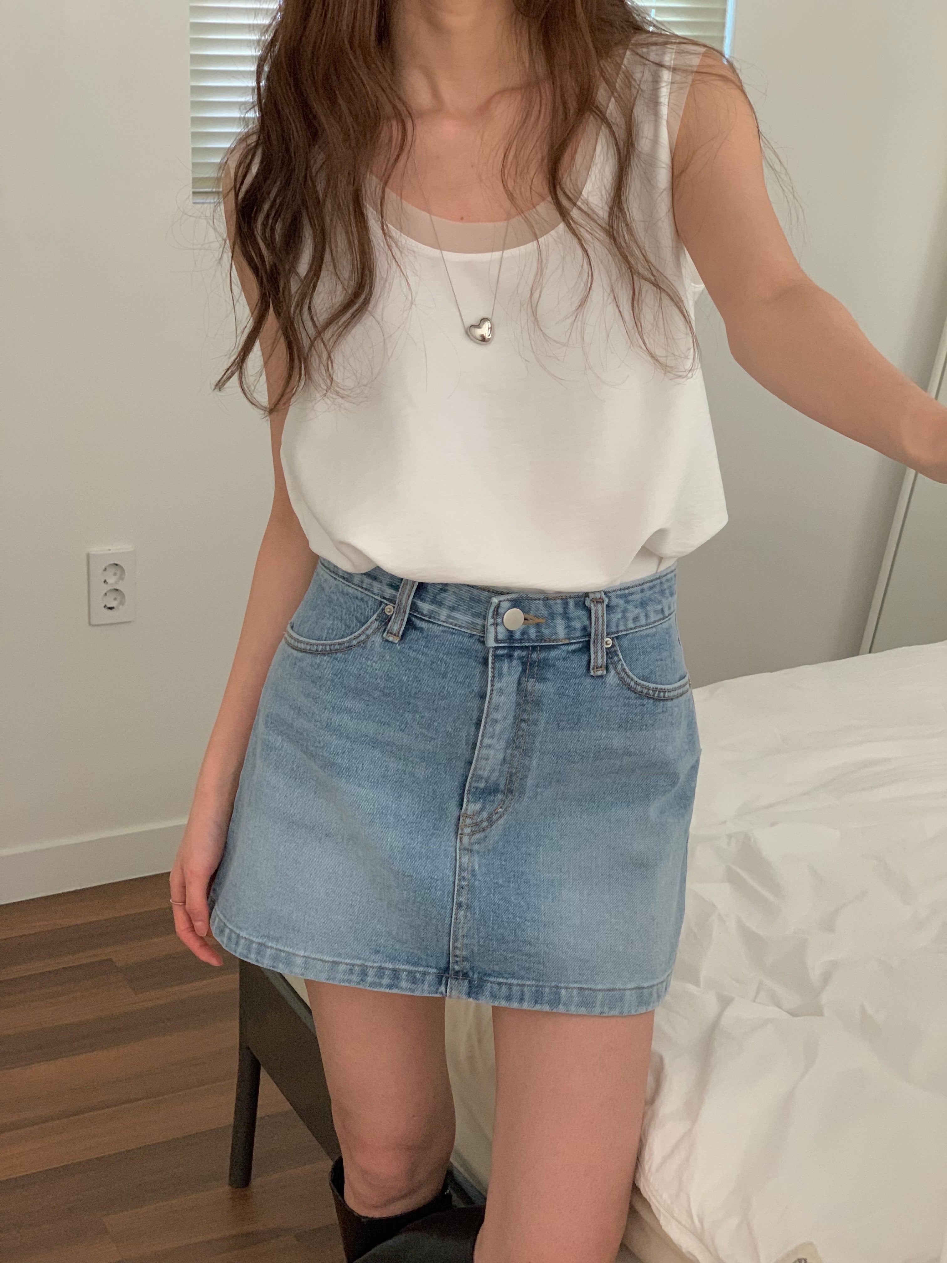 With Sleeveless Top