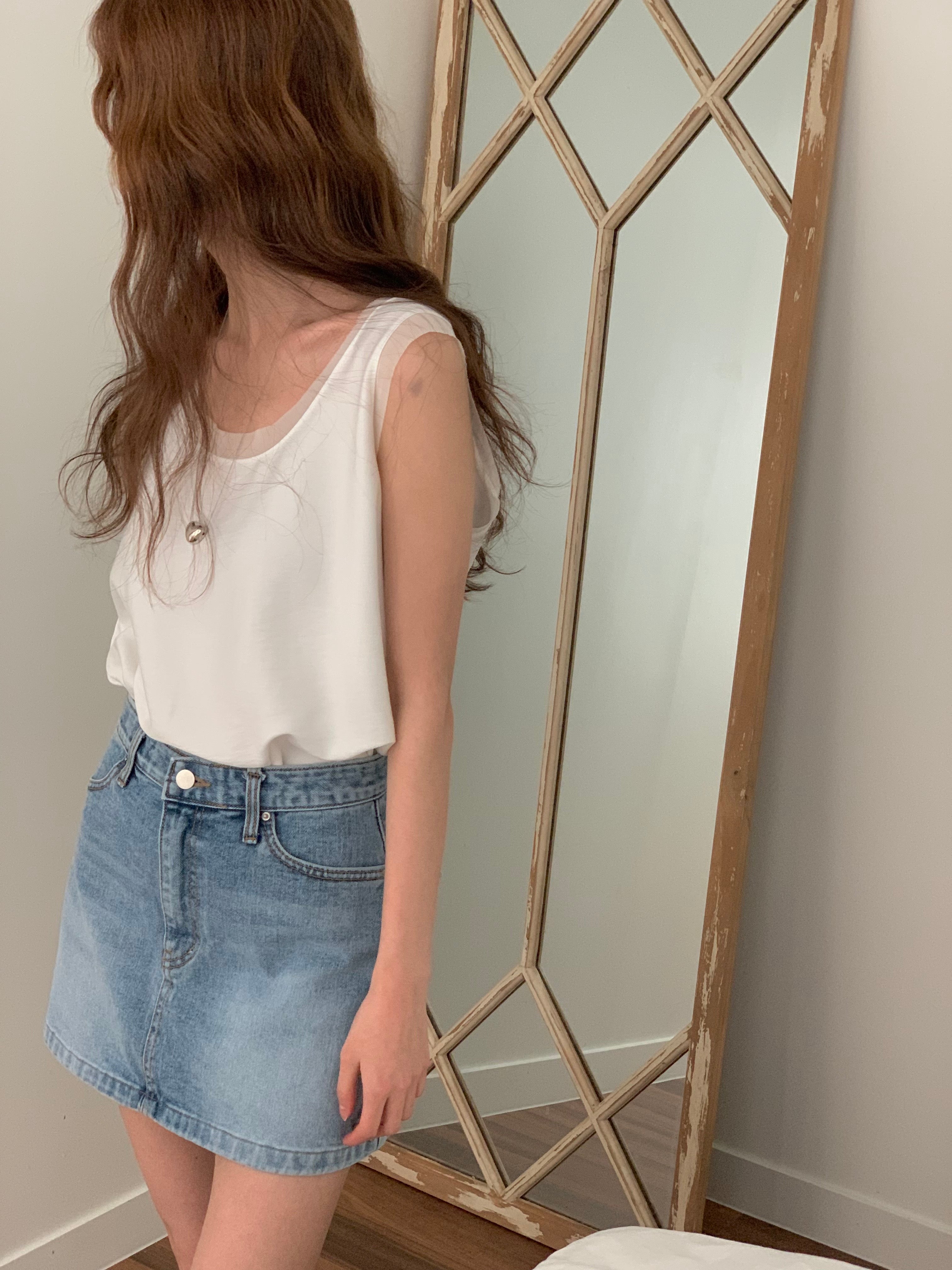 With Sleeveless Top
