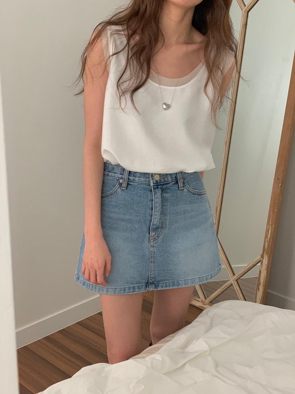 With Sleeveless Top